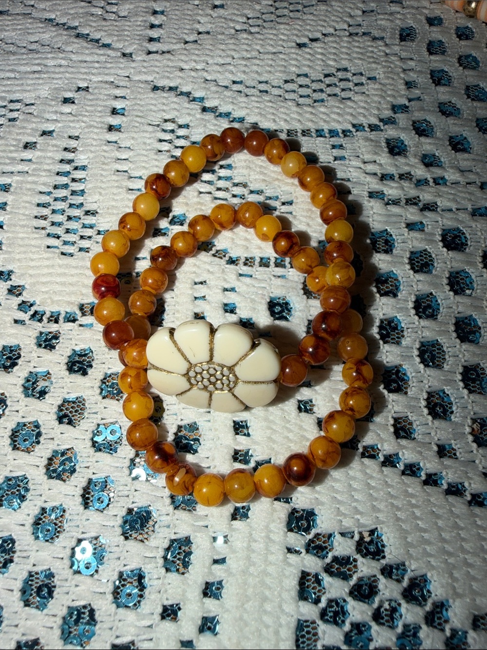 Amber Beaded Stretch Bracelet with White Flower Accent
